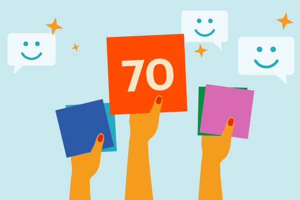 Three hands holding colored squares with numbers, one showing "70." Smiling speech bubbles surround the hands on a light blue background.